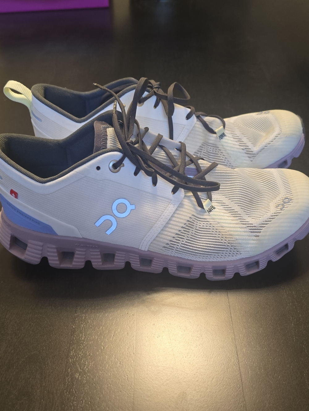 On Running Women's Athletic Shoes in White with Lavender Sole